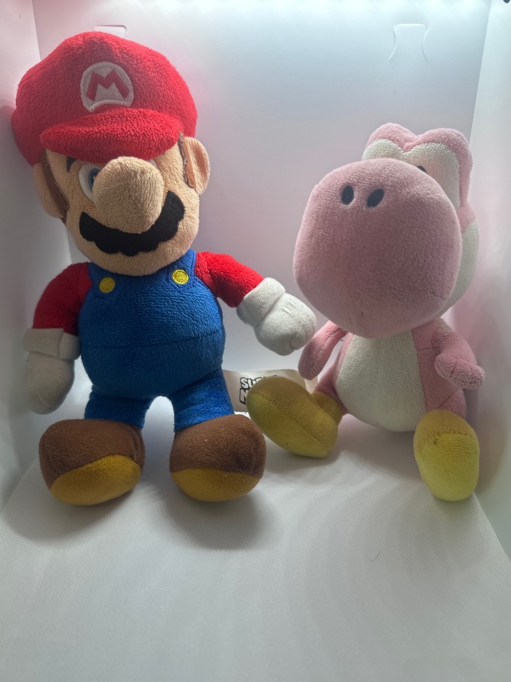 Nintendo Pink Yoshi Plush with Orange Spikes and Yellow Feet. Super Mario plush